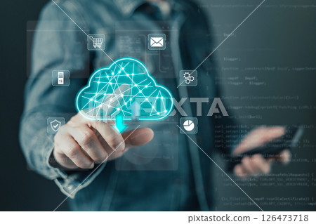 A person interacts with a glowing cloud icon representing cloud computing technology, highlighting data storage, digital solutions, and online connectivity for modern businesses and users. 126473718