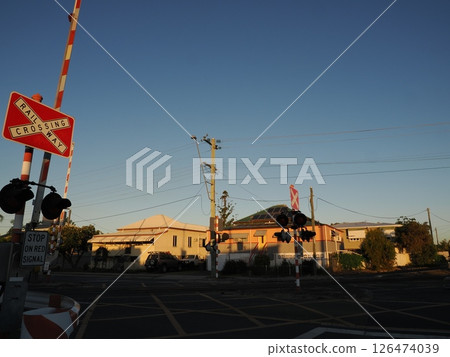 North Street railroad crossing at dusk, Rockhampton, Australia 126474039