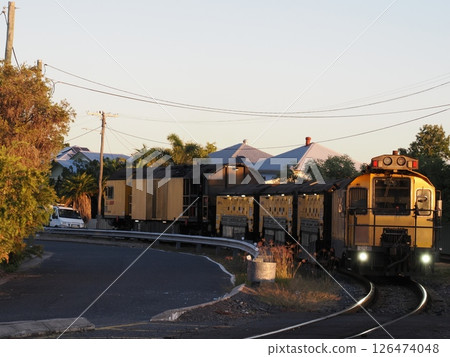 Railgrinder running along Tennyson Street, Rockhampton, Australia Railgrinder running along Tennyson Street, Rockhampton, Australia 126474048