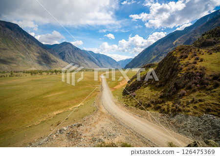 Aerial view of Chulyshman valley in Altai Russia surrounded by majestic mountains and wild nature Vast untouched landscape of Siberian wilderness 126475369