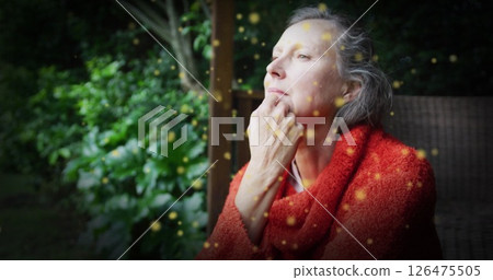 Image of green spots over thoughtful caucasian woman in garden Image of green spots over thoughtful caucasian woman in garden 126475505