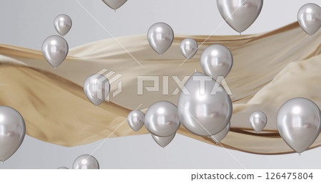 Image of silver balloons floating over gold and white background Image of silver balloons floating over gold and white background 126475804