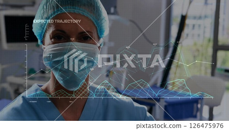 Image of data processing and diagrams over biracial female surgeon in operating room Image of data processing and diagrams over biracial female surgeon in operating room 126475976