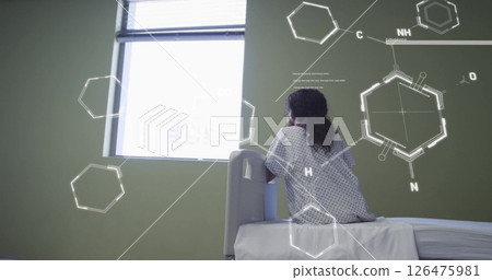 Image of chemical formula over biracial woman in operating room 126475981