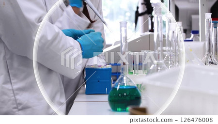 Image of white shapes over diverse scientists in lab 126476008