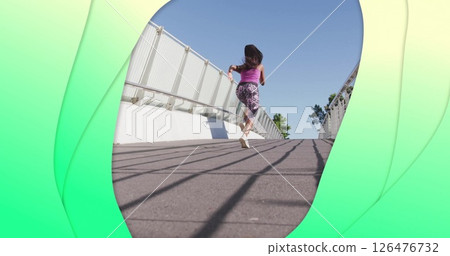 Image of green shapes over biracial woman running on bridge Image of green shapes over biracial woman running on bridge 126476732