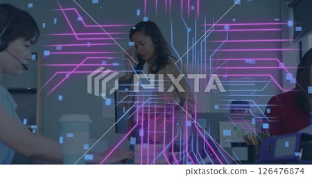 Image of computer circuit board with data processing over diverse colleagues in office Image of computer circuit board with data processing over diverse colleagues in office 126476874