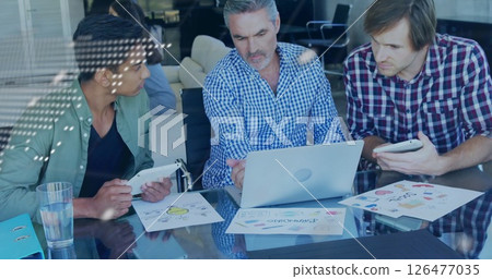 Image of financial data processing over diverse colleagues discussing work in office Image of financial data processing over diverse colleagues discussing work in office 126477035