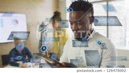 Image of digital screens with data over diverse colleagues talking and using tablet in office Image of digital screens with data over diverse colleagues talking and using tablet in office 126478002