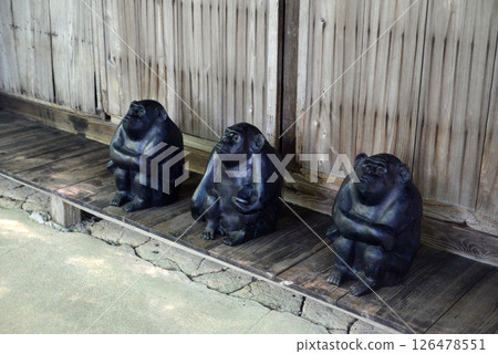 Three monkeys sitting on the veranda at Shikokumura Miuseum Three monkeys sitting on the veranda at Shikokumura Miuseum 126478551