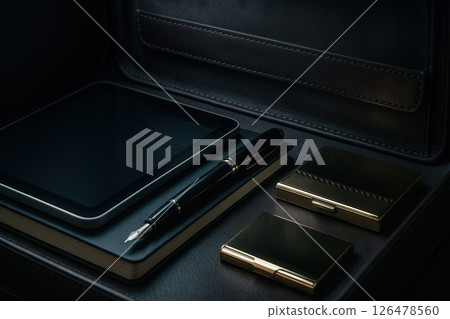 Interior View of Open Leather Executive Briefcase with Tablet, Fountain Pen and Business Card Holder 126478560