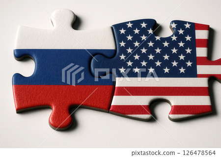 Puzzle Pieces with Russian and American Flags Fitting Together 126478564