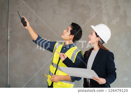 architect team on construction site inspection documents and business workflow in the morning. 126479120
