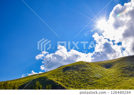 Mountains and sunshine on a sunny summer day Mountains and sunshine on a sunny summer day 126480284