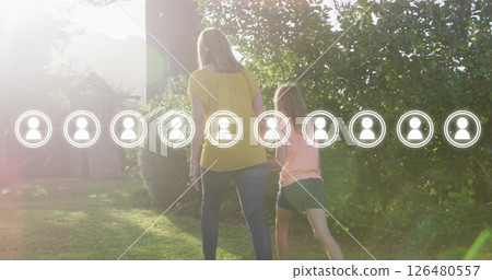 Walking in garden, social network connections image over people 126480557
