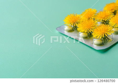 blister with pills and dandelion flowers, homeopathy, sedative, allergy blister with pills and dandelion flowers, homeopathy, sedative, allergy 126480700
