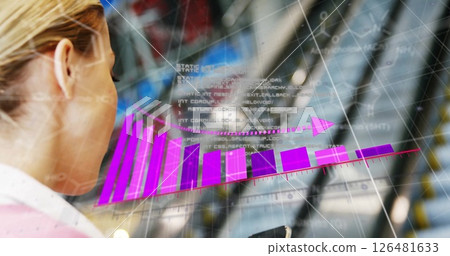 Analyzing financial data image over businesswoman in office environment 126481633