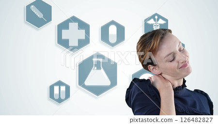 Woman experiencing neck pain with medical icons in background, seeking relief 126482827