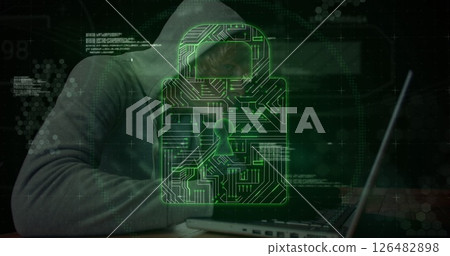 Hooded figure using laptop with digital lock overlay, symbolizing cybersecurity Hooded figure using laptop with digital lock overlay, symbolizing cybersecurity 126482898