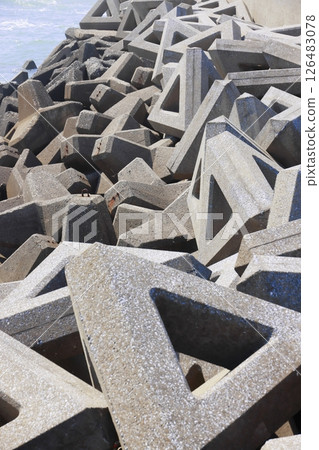 Wave-breaking blocks on the coast of Wada Town 126483078