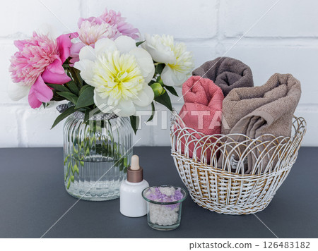 Spa products for facial and body care with soft terry towels. Spa products for facial and body care with soft terry towels. 126483182