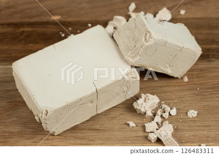 Wet Yeast Bricks for Homemade Dough Preparation. 126483311