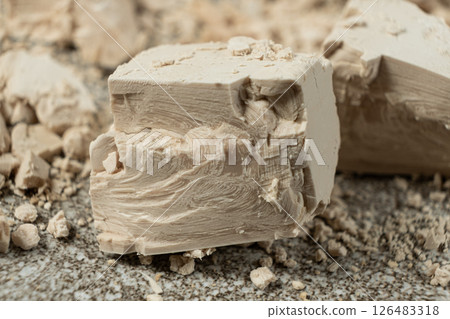 Compressed fresh yeast cubes close-up Compressed fresh yeast cubes close-up 126483318