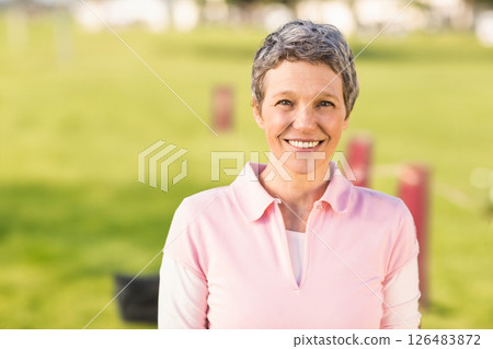 Smiling woman enjoying morning walk in park, feeling refreshed and happy, copy space Smiling woman enjoying morning walk in park, feeling refreshed and happy, copy space 126483872
