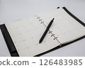 Schedule book and pen 126483985