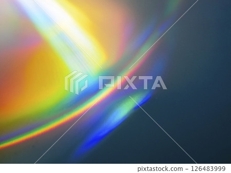 Rainbow colored shiny round object 126483999
