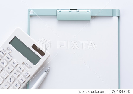 White calculator and binder 126484808