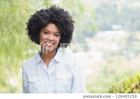Smiling woman enjoying outdoor nature, feeling relaxed and happy in sunlight, copy space Smiling woman enjoying outdoor nature, feeling relaxed and happy in sunlight, copy space 126485159