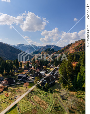 Drone view of Ainokura village in Toyama, Japan on a crisp autumn morning with gassho houses 126485716