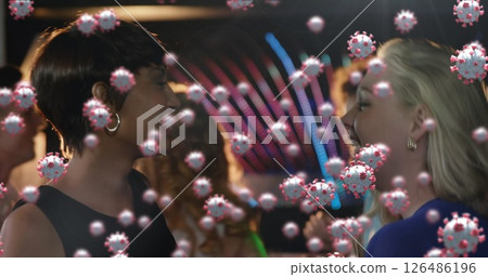 Image of cells floating over multi-ethnic group of people dancing at a party Image of cells floating over multi-ethnic group of people dancing at a party 126486196