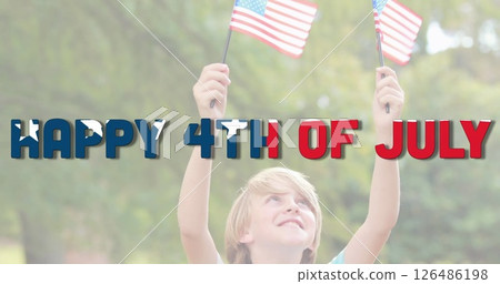 Child celebrating Independence Day holding American flags outdoors, smiling joyfully Child celebrating Independence Day holding American flags outdoors, smiling joyfully 126486198