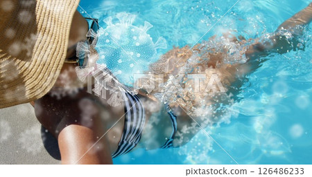 Swimming in pool, woman in swimsuit with virus illustration, emphasizing health awareness Swimming in pool, woman in swimsuit with virus illustration, emphasizing health awareness 126486233