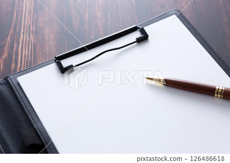 Black calculator and binder 126486618