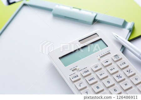 White calculator and binder White calculator and binder 126486911