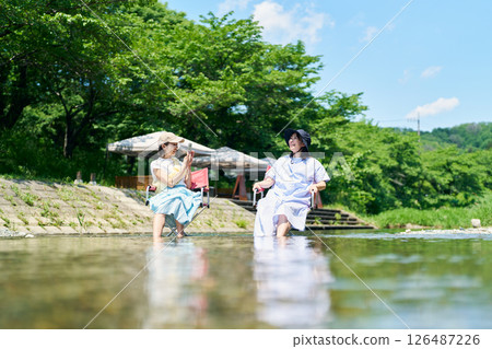 woman cooling off in the river 126487226