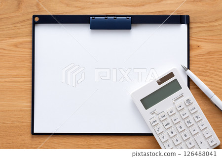 Binder, calculator and ballpoint pen Binder, calculator and ballpoint pen 126488041