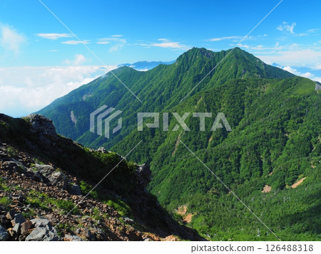 Summer view of Mt. Gongen from Mt. Akadake in the Yatsugatake Mountains 126488318