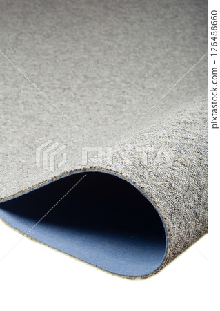 Rolled Carpet Flooring with Blue Backing Isolated on White Background Rolled Carpet Flooring with Blue Backing Isolated on White Background 126488660