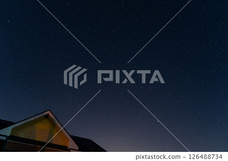 A star shining in the night sky 126488734