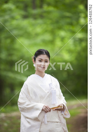 Bride wearing white dress Bride wearing white dress 126488762