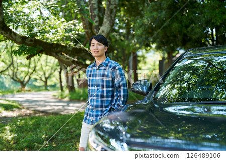 Man getting out of the car Man getting out of the car 126489106