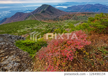 Oshozan mountain seen from the summit of Mt. Adatara in autumn colors Oshozan mountain seen from the summit of Mt. Adatara in autumn colors 126490134