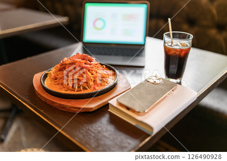 Lunch scene with pasta and laptop 126490928