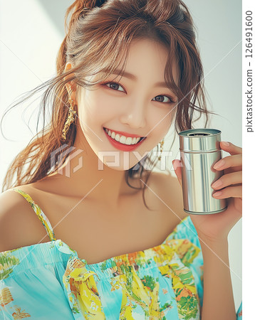 Young woman enjoying a bright moment with a stainless steel container in a vibrant, colorful outfit Young woman enjoying a bright moment with a stainless steel container in a vibrant, colorful outfit 126491600