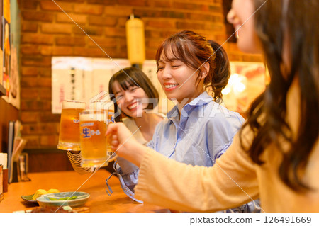 A scene at an izakaya A scene at an izakaya 126491669