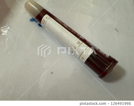 Syringe with blood drawn 126491998